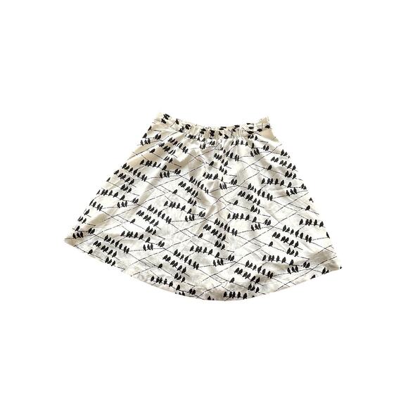 FOREVER 21, SIZE LARGE, WHITE SKIRT WITH BLACK BIRDS - Picture 2 of 3